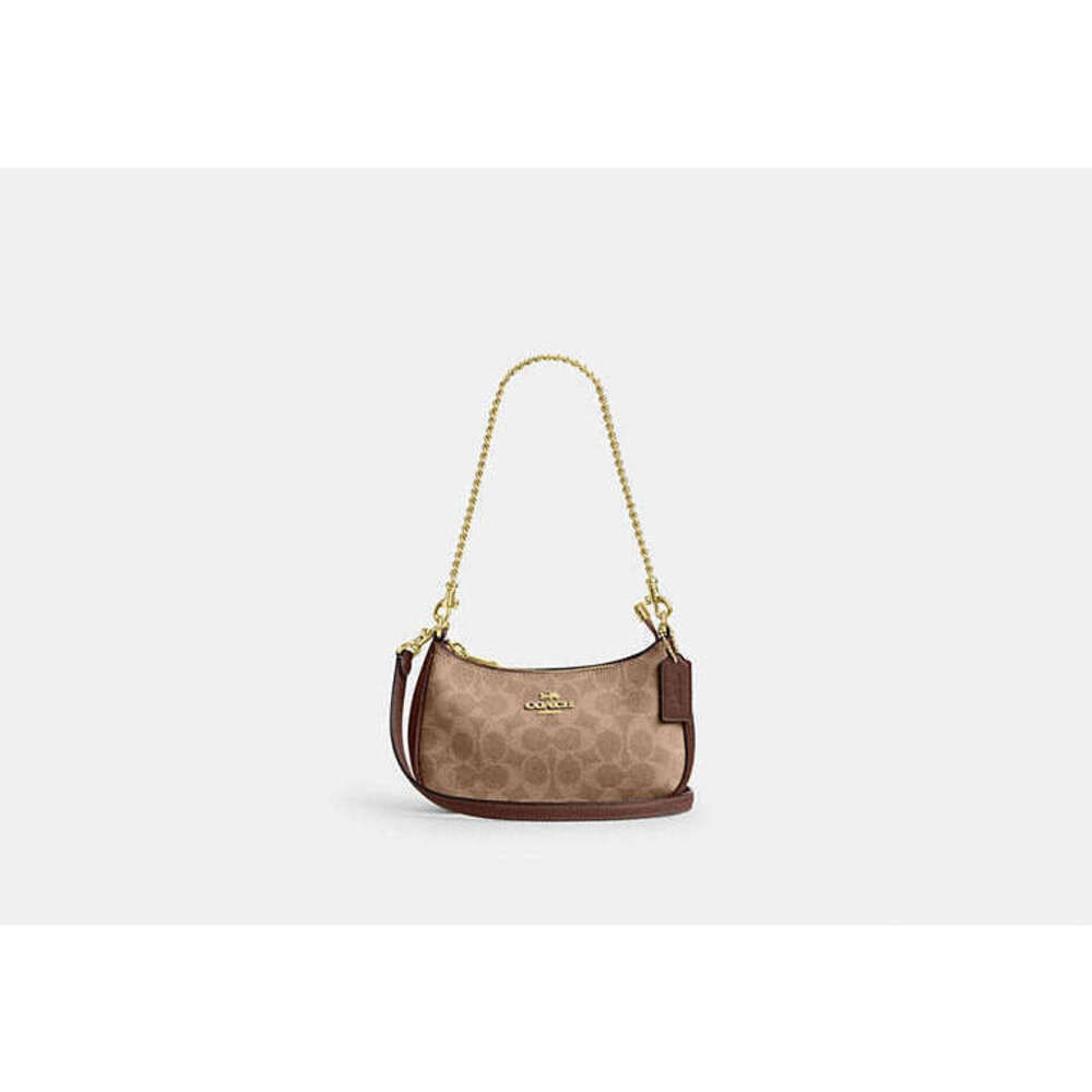 Teri Mini Crossbody Bag In Signature Canvas